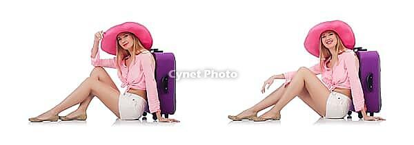 Woman preparing for travel on summer vacation [IBR125094415]