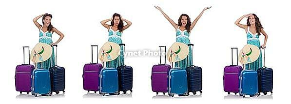 Woman traveller with suitcase isolated on white [IBR125094427]