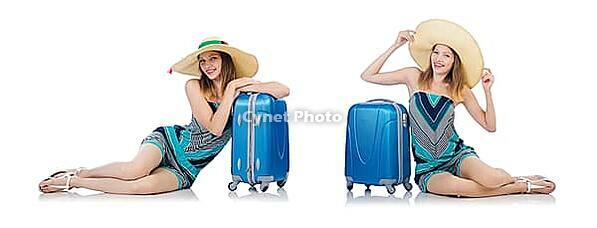 Woman with suitacases preparing for summer vacation [IBR125094429]