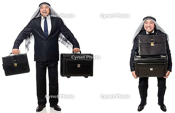 Arab businessman with suitcase isolated on white [IBR125117971]