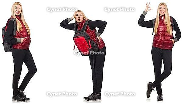 Young woman with backpack isolated on white [IBR125117989]