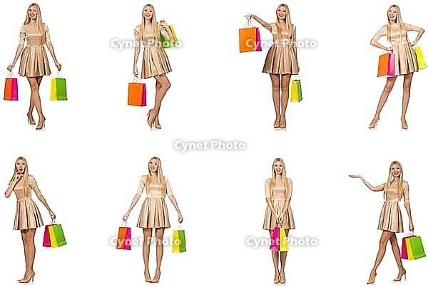 Beautiful woman in golden dress with bags [IBR125117990]