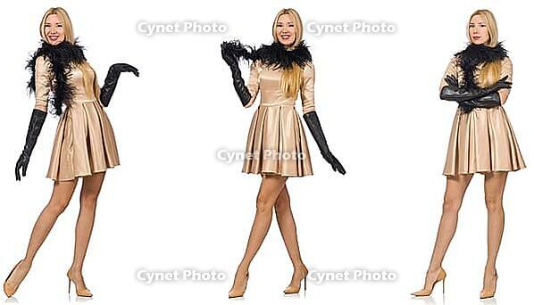Beautiful woman in golden dress isolated on white [IBR125117991]