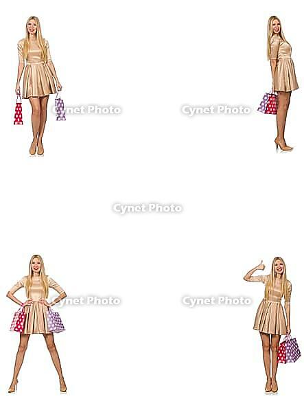 Beautiful woman in golden dress with bags [IBR125118012]