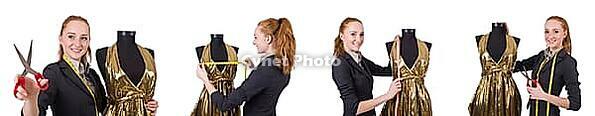 Woman tailor isolated on white [IBR125118058]