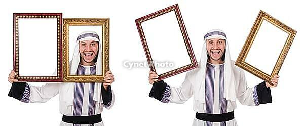 Arab man with picture frame isolated on white [IBR125118061]