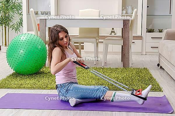 Young beautiful woman doing exercises at home [IBR125141696]