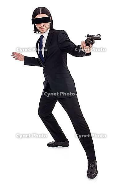 Young man with covered eyes and gun isolated on white [IBR125141707]