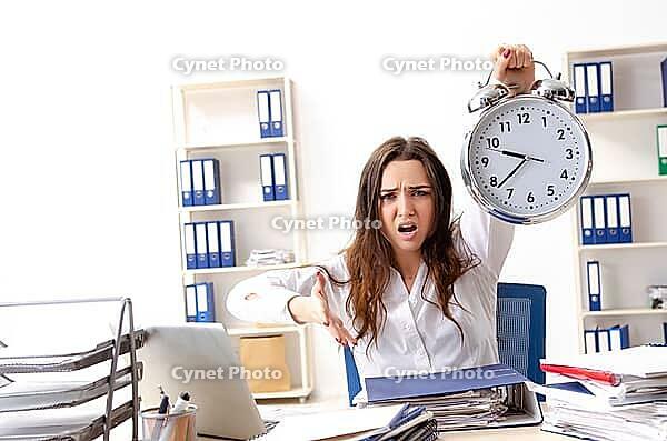 Young female employee unhappy with excessive work [IBR125141723]