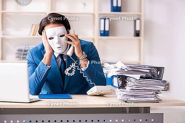 Male employee in the office in industrial espionage concept [IBR125141770]