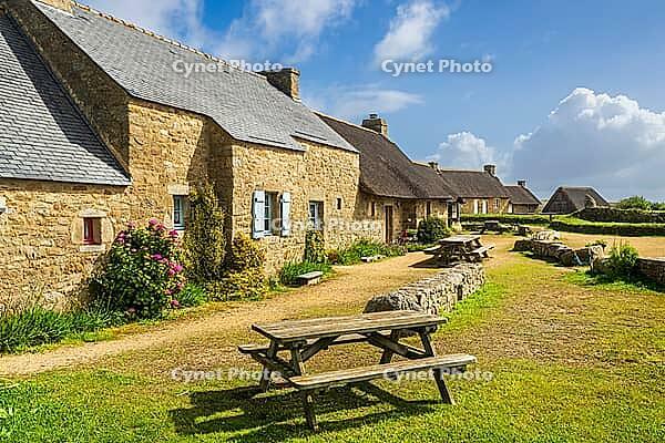 Meneham is a historic former fishing village near Kerlouan in northern Finistère, Brittany, France. Traditional stone houses are set among massive granite boulders close to the Atlantic coast, creating a distinctive coastal settlement that reflects the ma [IBR125163373]