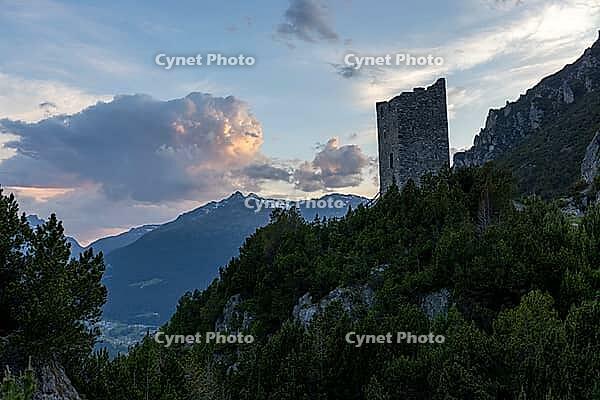 Torri di Fraele, historic watchtowers, with clouds at dusk, Valdidentro, Sondrio, Italy [IBR125163381]