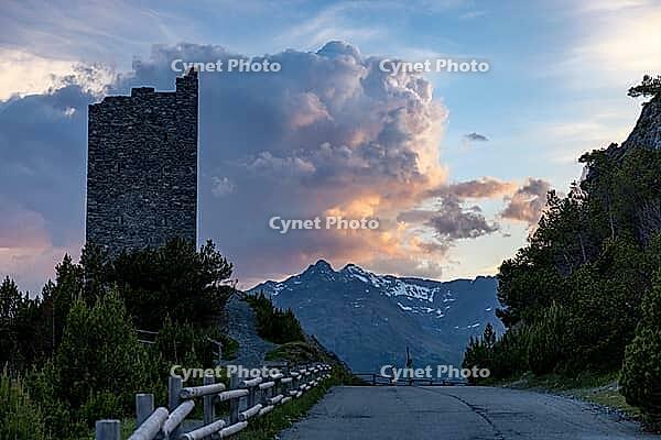 Torri di Fraele, historic watchtowers, with clouds at dusk, Valdidentro, Sondrio, Italy [IBR125163385]
