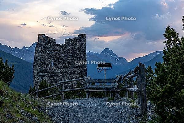 Torri di Fraele, historic watchtowers, with clouds at dusk, Valdidentro, Sondrio, Italy [IBR125163390]