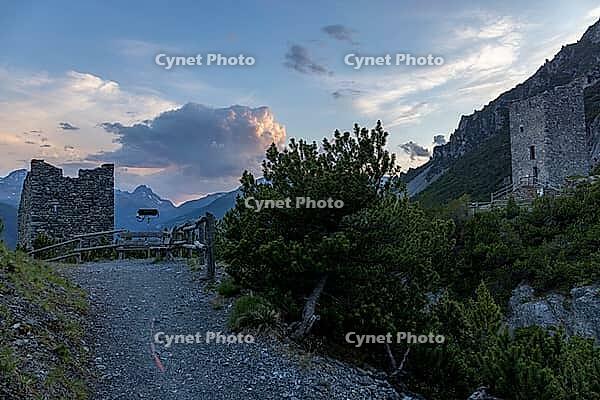 Torri di Fraele, historic watchtowers, with clouds at dusk, Valdidentro, Sondrio, Italy [IBR125163395]