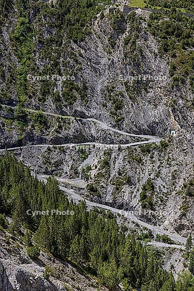 Diga lago Cancano and serpentines on a service path, Cancano Lake dam, Valdidentro, Sondrio, Italy [IBR125163421]
