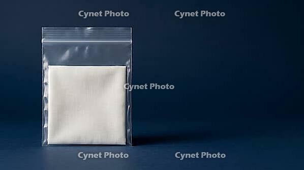 Clear sealed laboratory polyethylene bag containing plain unidentified white fabric swatch, fiber composition deliberately undisclosed, textile reference material blind validation test concept, deep navy background, studio shot, AI generated [IBR125167444]