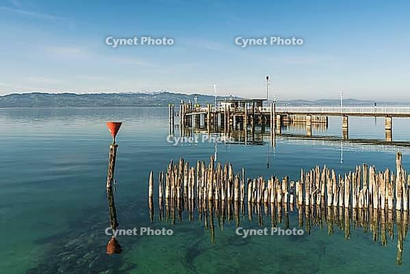 Shipping docks and wooden platforms on Lake Constance, moated castle, Bavaria, Germany [IBR125173447]