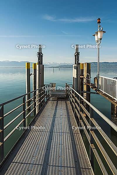 Metal footbridge with view of the Alps, moated castle am Lake Constance, Bavaria, Germany [IBR125173453]