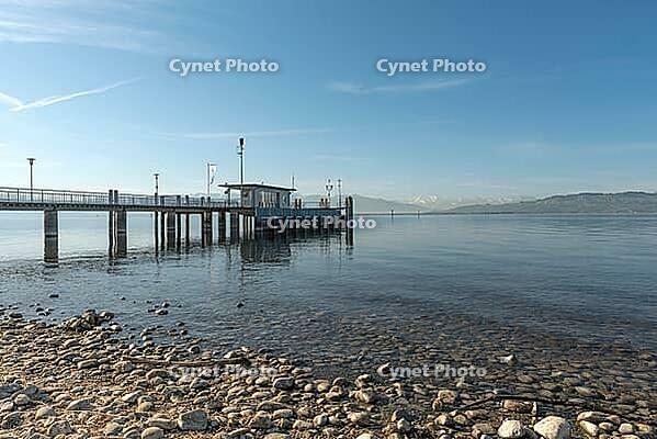 Jetty with a view of the Alps, moated castle am Lake Constance, Bavaria, Germany [IBR125173460]