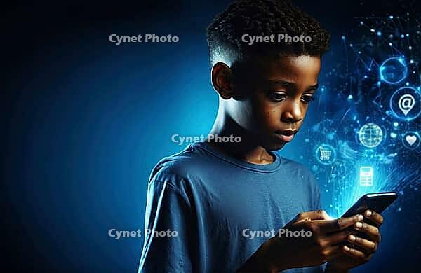 Boy concentrating on smartphone with digital symbols and blue futuristic background, AI generated [IBR125173468]