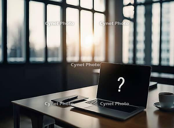 A modern office setting with a laptop displaying a question mark, sunlight streaming through large windows, AI generated [IBR125173472]
