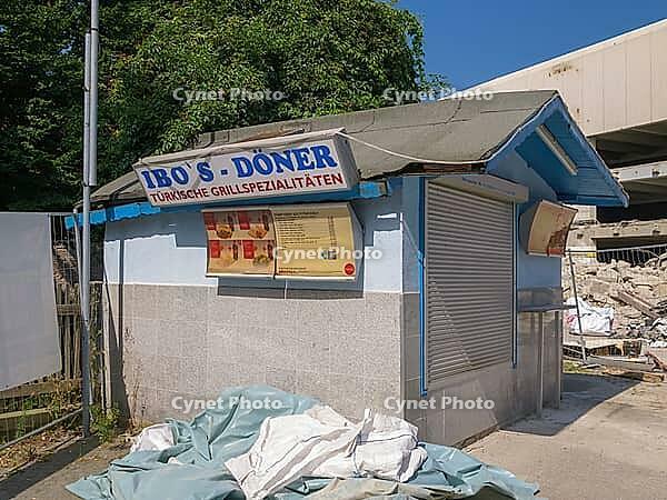 Demolition site with snack in front of demolition [IBR125180346]