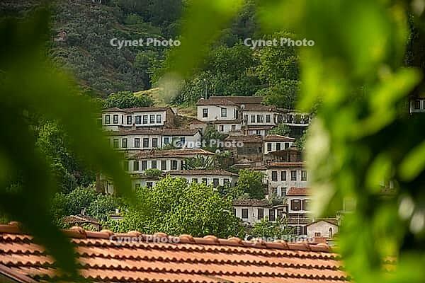 A panoramic view of the historic hillside village of Sirince with traditional white Ottoman houses [IBR125180374]