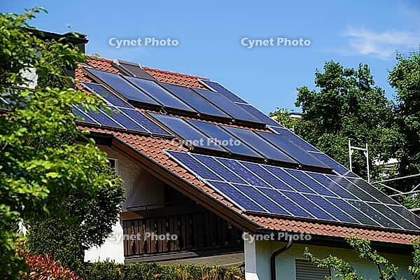 Country house with solar modules for photovoltaic and solar thermal panels on the large roof. Living in the countryside - the dream of owning your own home [IBR125185830]