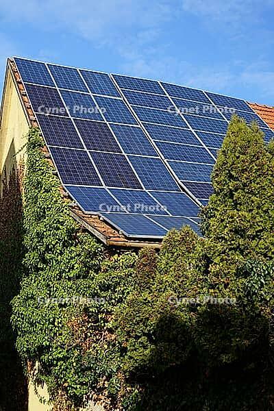 Solar panels on an old barn [IBR125185837]