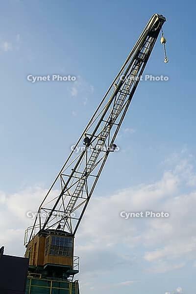 A historic port crane in Cologne. The crane is located at Rheinauhafen and is a heritage-protected building [IBR125185844]