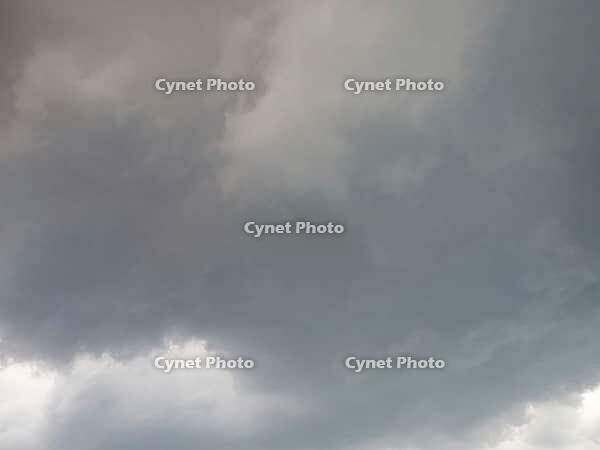 Dense grey cloud cover that radiates a stormy atmosphere, heavy cloudiness in the sky in 27798 Hude, Germany [IBR125185867]