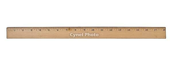 Vintage wooden school ruler over white, clipping path [IBR125188154]