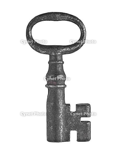 Vintage rusty cabinet lock key over white [IBR125188181]
