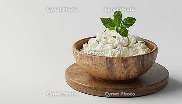Creamy Ricotta Cheese Served In A Bowl Garnished With Fresh Mint Leaves On A Rustic Wooden Table. Delicious And Appetizing Presentation, AI generated [IBR125200665]