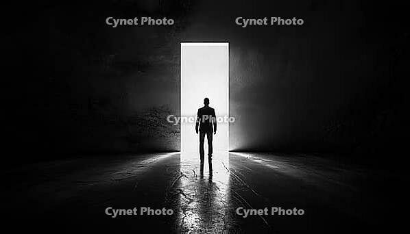 Man Escaping Darkness Through Illuminated Door: Surreal Black And White Image Captures Transformation From Shadow To Light, AI generated [IBR125200724]