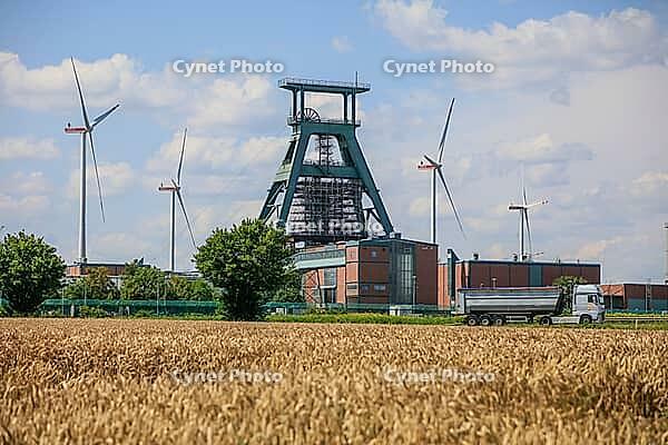 Abandoned Konrad 1 iron ore mine with conveyor framework, being converted into a repository for low and medium radioactive waste, wind turbines, Salzgitter, Lower Saxony, Germany [IBR125203159]