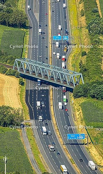Aerial view, A2 motorway near Kamener Kreuz motorway junction, highway A1 and motorway A2, road traffic and truck traffic, Kamen, railway bridge, bridges, Ruhr area, North Rhine-Westphalia, Germany, motorway, BAB, motorway junction, air suspension, overvi [IBR113322314]
