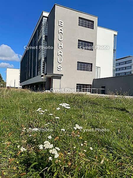 The famous Bauhaus building in Dessau. Architect: Walter Gropius. Built 1925 - 1926. Groundbreaking example of modern functionalist architecture. The building impresses with large industrial-style lettering and windows, which are intended to bridge the ga [IBR113322401]