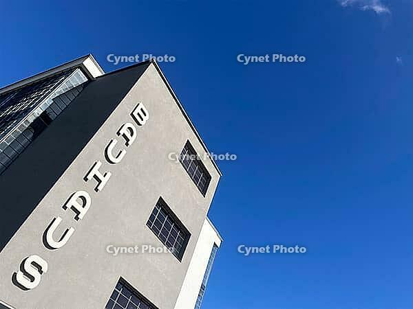 The famous Bauhaus building in Dessau. Architect: Walter Gropius. Built 1925 - 1926. Groundbreaking example of modern functionalist architecture. The building impresses with large industrial-style lettering and windows, which are intended to bridge the ga [IBR113322426]