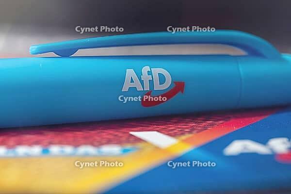 AfD symbolic image: close-up of a flyer and ballpoint pen [IBR113322470]