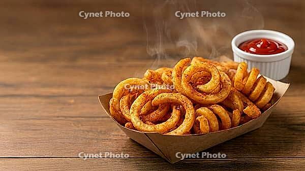 A cardboard boat filled with spicy curly fries with a ramekin on the side filled with ketchup. An appetizer and fast food favorite, AI generated [IBR125237528]