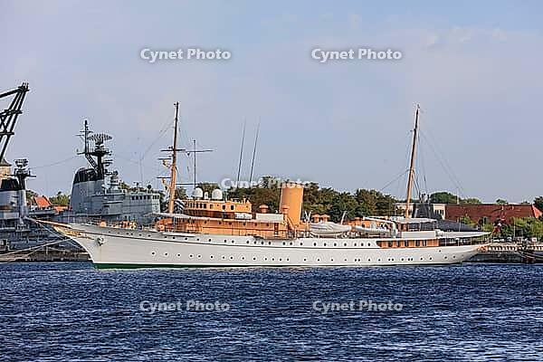Royal yacht Kongeskibet Dannebrog in front of Copenhagen Naval Station on Nyholm, seen from Langelinie, Copenhagen København, Zealand Sjælland, Denmark, Baltic Sea [IBR125242415]
