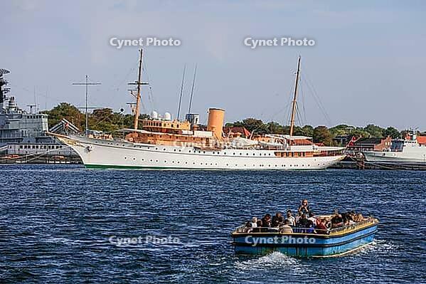 Royal yacht Kongeskibet Dannebrog in front of Copenhagen Naval Station on Nyholm, seen from Langelinie, Copenhagen København, Zealand Sjælland, Denmark, Baltic Sea [IBR125242430]