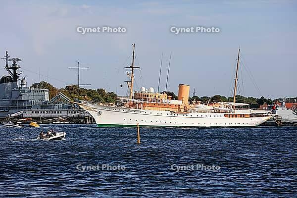 Royal yacht Kongeskibet Dannebrog in front of Copenhagen Naval Station on Nyholm, seen from Langelinie, Copenhagen København, Zealand Sjælland, Denmark, Baltic Sea [IBR125242435]