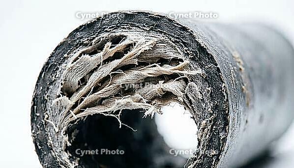 Abstract macro of pipe wall material caught mid-flex under sudden internal pressure, water hammer deformation process, studio shot, AI generated [IBR125242462]