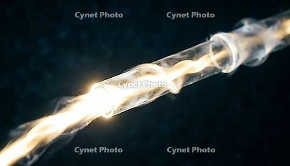 Abstract glowing pulse of light traveling along a pipe-shaped path, water hammer pressure shockwave visualization, studio shot, AI generated [IBR125242481]