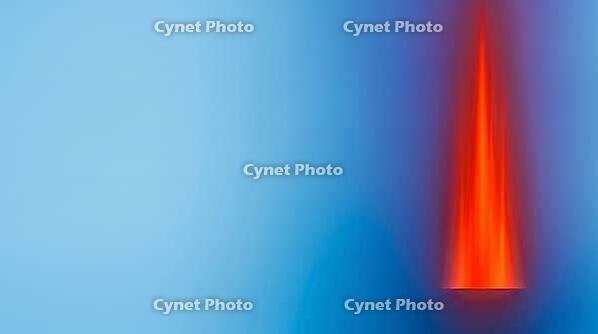 Abstract color-field gradient transitioning from calm blue steady flow to an intense red pressure spike, water hammer visualization, studio shot, AI generated [IBR125242485]