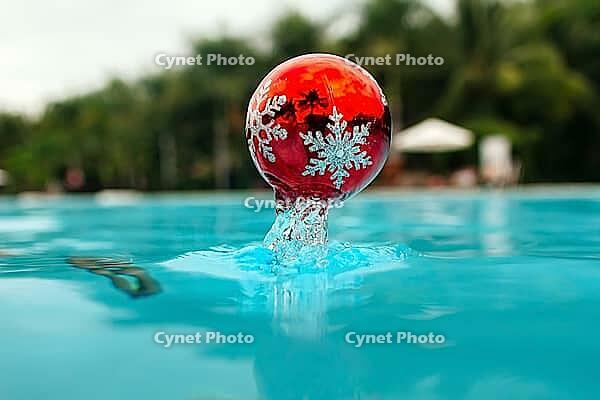 New year tree decoration in the water, christmas decoration in blue water in tropics [IBR125261594]