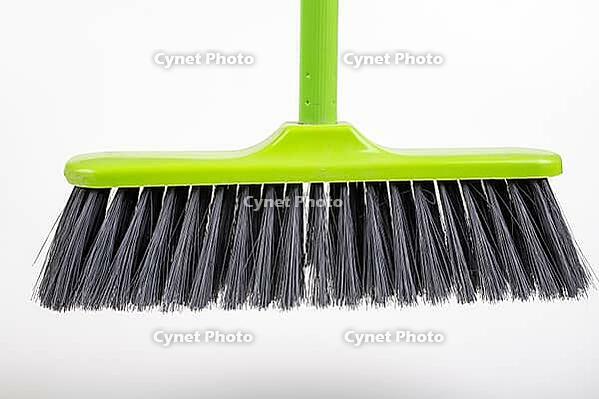 A new cleaning broom. Accessories to keep things tidy. Light background [IBR125261612]
